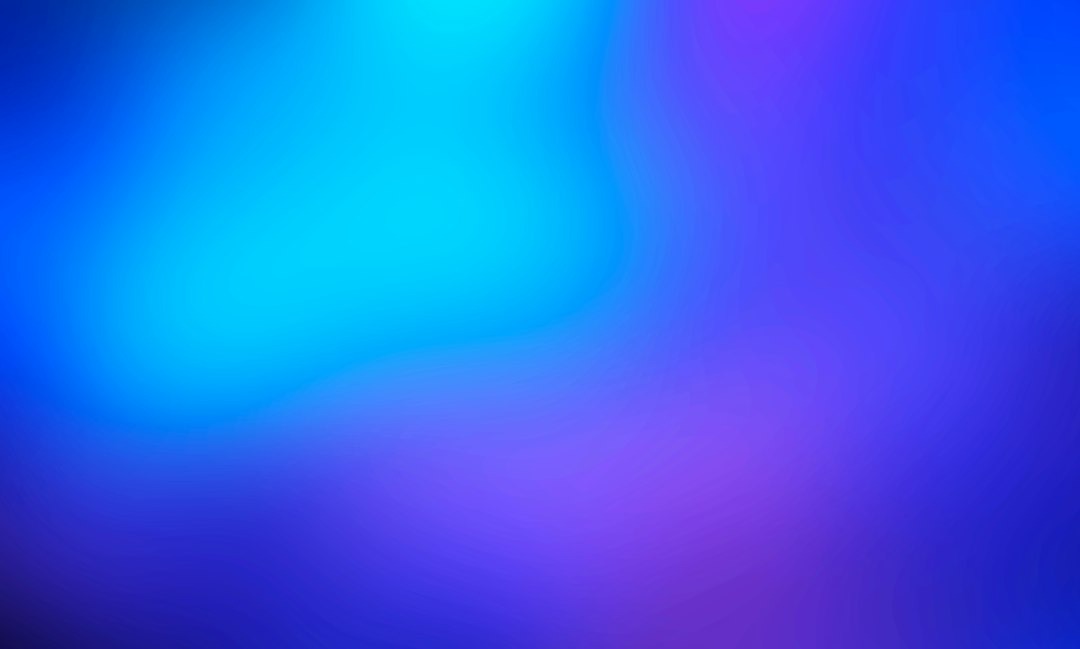 Abstract gradient with smooth transitions of cyan, blue, and purple.